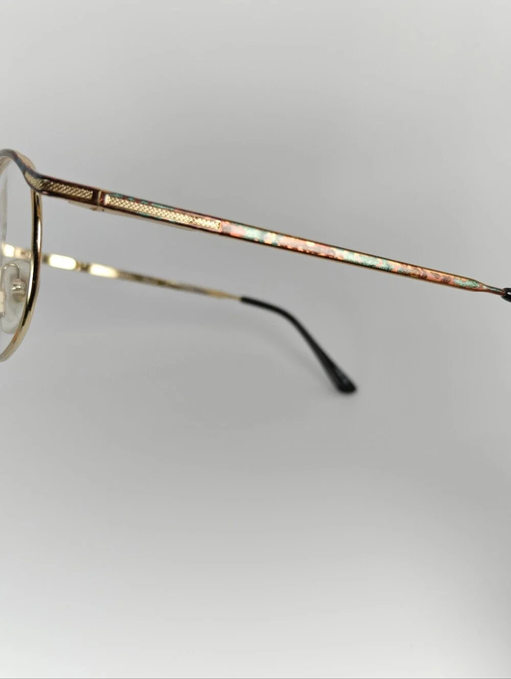 Manola Odo Frames Round Gold-Tone. Glasses with Subtle Copper Weathered Patina.